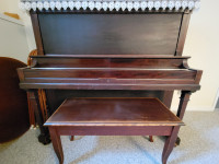 Like new Bell piano, Canadian made.