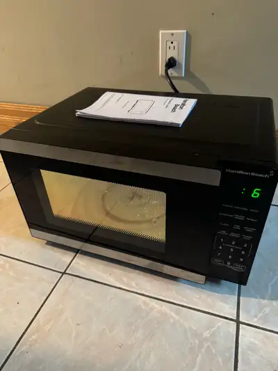 1100 watt Hamilton Beach microwave oven , View more