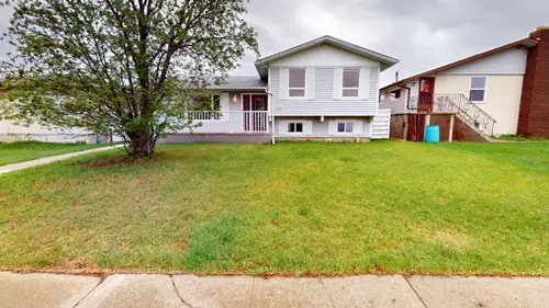 3 Level side split, 3Bdrm, 1.5 bath, heated double garage, large private lot - see full details at C...