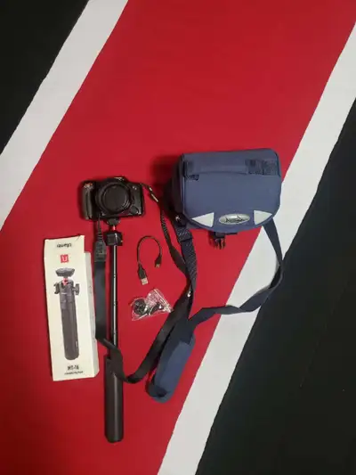 Camera for sale, with a selfie stick, but you can also can use it as a stand, it comes with a bag, i...