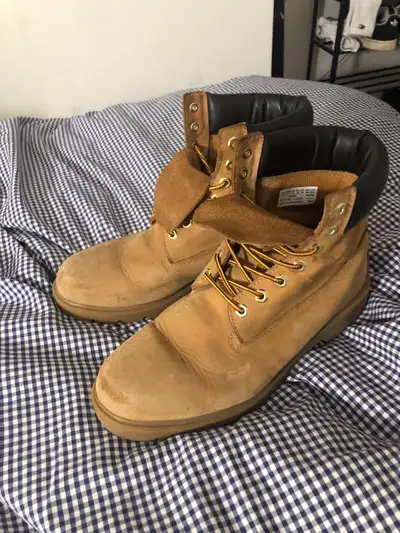 Selling a pair of Timberland boots, size 12, perfect for any weather, offering durability and classi...