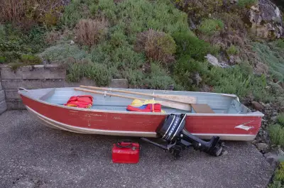 Good family boat. 5 life jackets, oars, 3 gallon gas tank. Motor serviced spring 2025, tested with b...