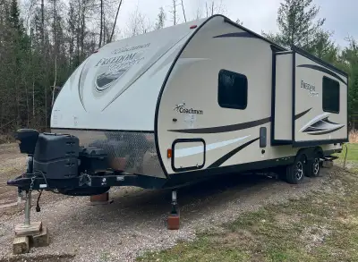 Coachman travel trailer for sale. Trailer is 24.5 feet long. Comes with 2 propane tanks, 2 batteries...
