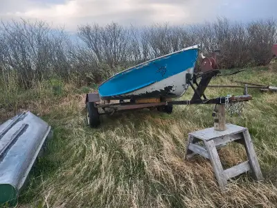 Selling 14 foot aluminum fishing boat . Have removed the back bench and put wood floor in with 2 swi...