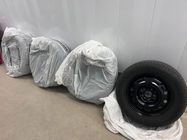 OEM Mazda 3 Continental winter tires - Like new in Tires & Rims in City of Toronto