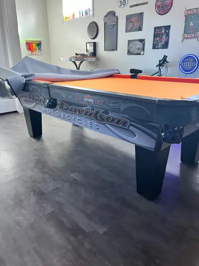 This top quality, Harley Davidson 3 pc Slate pool table is constructed specially for Harley Davidson...
