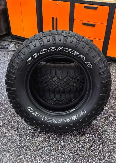I'm selling a set of four Goodyear Wrangler Duratrac tires, size LT 275/70 R18 125/122r load range E...