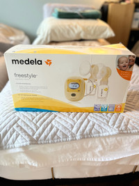 Medela Freestyle Double Electric Breast Pump and Medela Hakka Ma