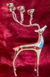 NEW SILVER PLATE REINDEER CANDLE HOLDER.