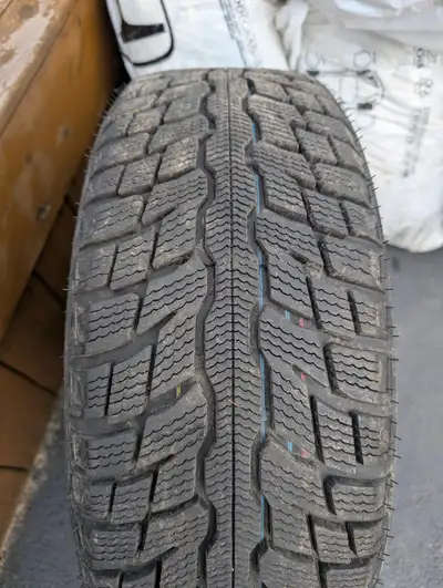 4 Uniroyal tiger paw tires mounted on Honda factory steel wheels. tire size 215/55/R16 Only driven o...