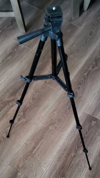 Black tripod for camera and cellphone