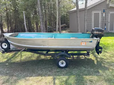 12 foot Peterborough aluminum 1985 9.8 HP mercury 2 stroke motor and fuel tank trailer with tilt I p...