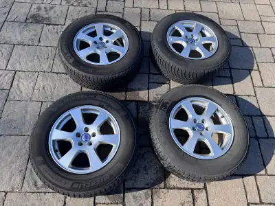 I am selling a set of almost new Michelin X-Ice Snow SUV tires, size 235/65 R17, mounted on genuine...