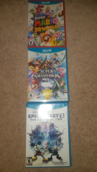 Wii U games.  Super Mario 3D World, Epic Mickey 2, 