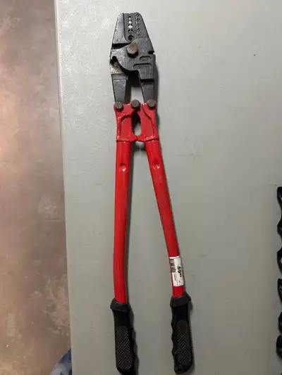 This is a used cable crimper, perfect for any electrical work requiring secure and tight cable conne...