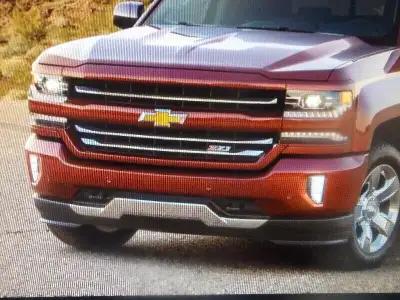 YES IM LOOKING FOR THE LOWER FRONT VALENCE WITH CHROME MUSTACHE FOR 16 TO 18 SILVERADO 1500........P...