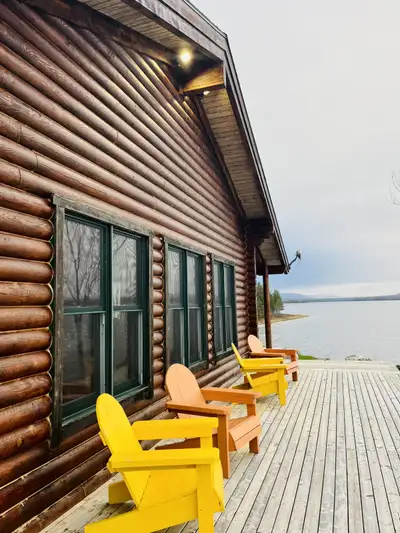 Well maintained Kenomee log home plus immaculately maintained guest cottage on approximately 3 acres...