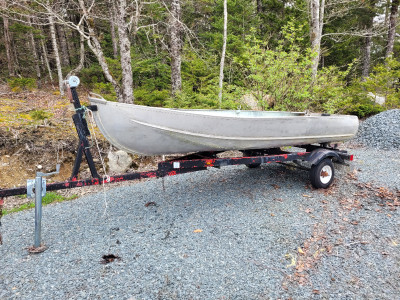 Old 12" Aluminum boat with 6HP Mercury short shaft outboard and