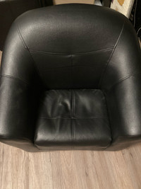 Child’s black leather chair