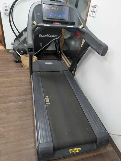This is a used Technogym treadmill, perfect for home fitness enthusiasts looking for a reliable mach...