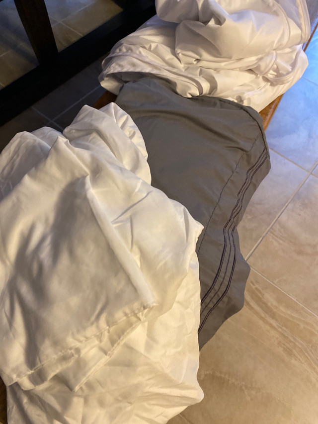 2 Twin xl sheet sets and one bed bug mattress cover  in Bedding in City of Halifax