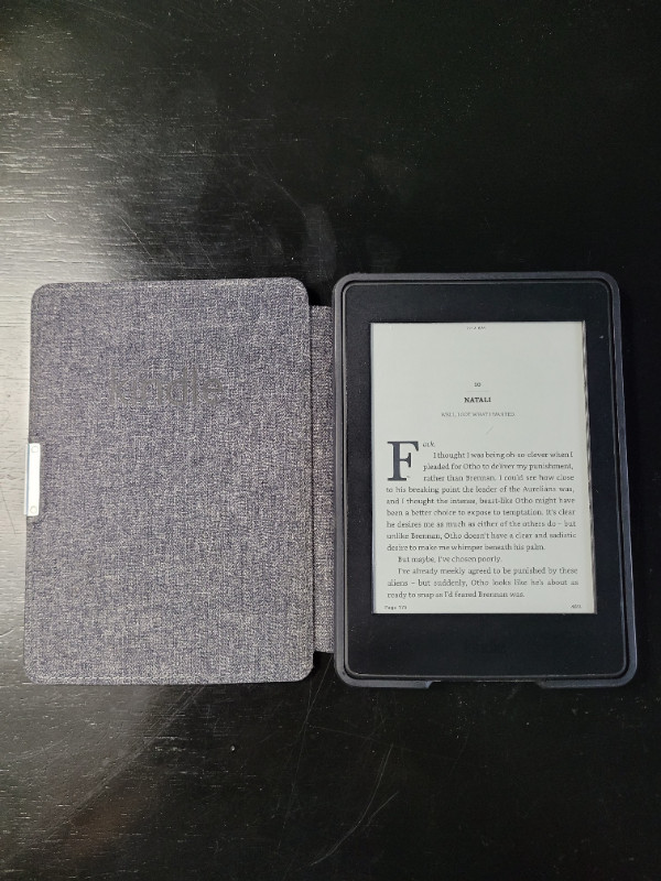 7th generation kindle paperwhite with leather case in General Electronics in Brandon