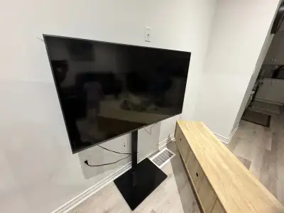 55 inch 4k TCL Roku tv with stand mount