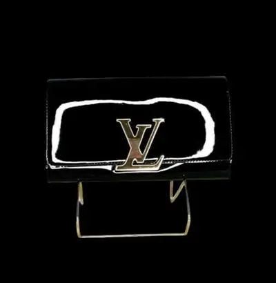 Authentic Louis Vuitton “Sobe Louise EW Clutch” in Vernis Noir In immaculate, like-new condition wit...