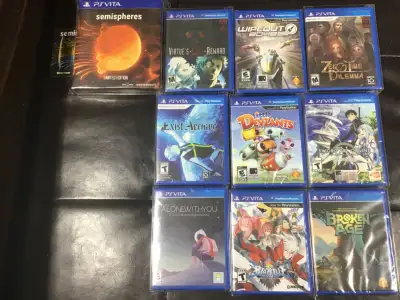 Sealed PS Vita games lot with protectors!!, View more