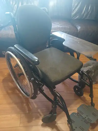 Wheelchair with accessories, View more