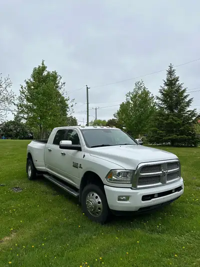 This is a well maintained Ram 3500 Megacab from 2015, offering robust diesel power and a luxurious L...