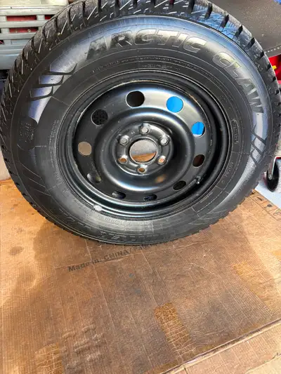 Winter tires on rims decent tread left. Selling mostly for the rims. Were on a 2012 Chevy Traverse 6...