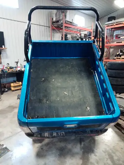 60 volt electric " mini truck" Basically a golf cart with .... Power windows Heat A/C Bluetooth radi...
