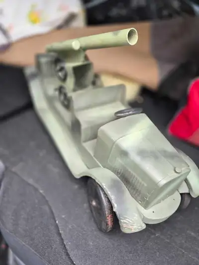 Great condition old Dayton toy army truck with gun and bullet, located Paris Ont, pick up only, chec...