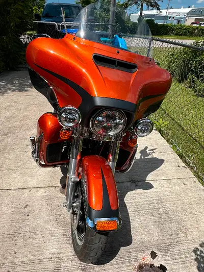 This is an amazing Ultra limited in the Harley orange with black accents. Too many extras to list.
