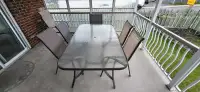Patio table + 5 chairs 