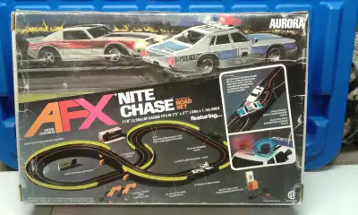 Vintage AFX "NITE CHASE" Police Car VS. Camaro Slot Car Set., View more