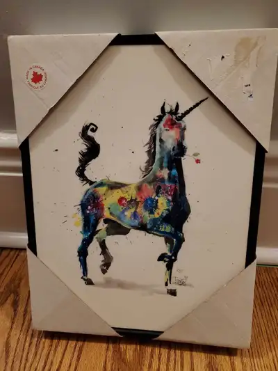 Brand new in package Unicorn picture One small hole in back but doesn't effect picture in any way $1...