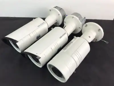 Lot of 3 (2 With Top Covers) 3 Megapixel WDR IR Bullet Network Cameras The DS-2CD4232FWD-IZH from Hi...