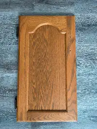 12 oak Kitchen cabinet doors for $25