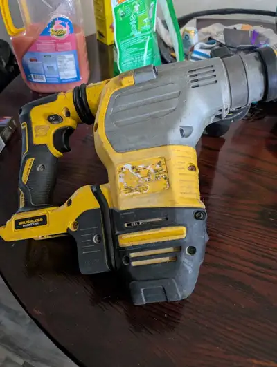 I'm selling a used DeWalt rotary hammer drill that is perfect for heavy-duty tasks with its powerful...