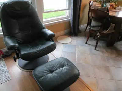 Leather swivel chair & matching foot stool, dark green. Down sizing need it gone asap. No holds ...F...