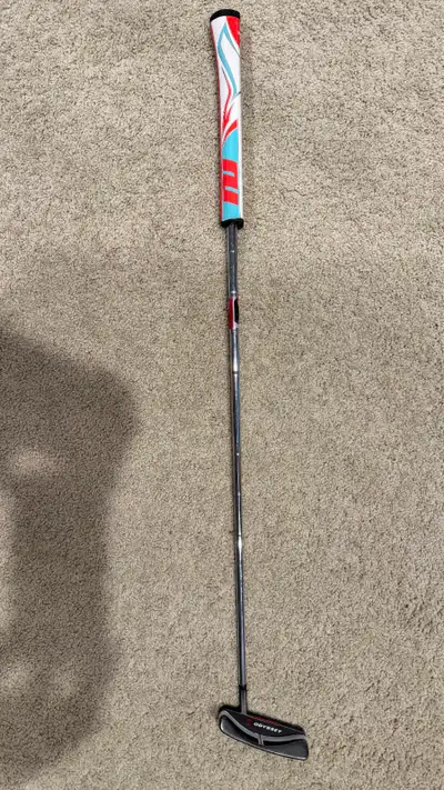 Odyssey putter with SuperStroke 2.0 pilot grip. Excellent condition. Comes with original head cover.