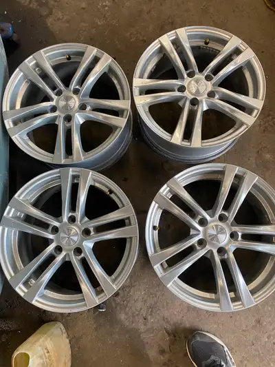 I HAVE 4 AFTERMARKET RIMS FOR 2015-18 SUBARU WRX,LEGACY. 17x7.5 5ON114.3 CENTRE BORE 56.1. IN GOOD C...