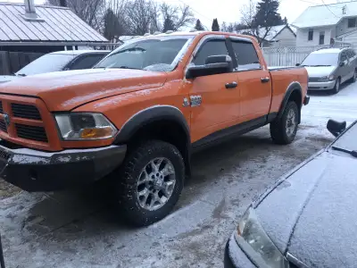 2011 dodge Cummins. Tires in good condition, 35’s on it. 4x4. A/c. Cloth seats. 228,000km on her. Go...
