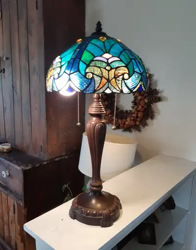 Excellent condition. 24"H. Double socket. Heavy base. Price is firm.