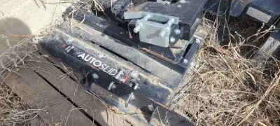 Two reese fifth wheel Hitches One is a auto slide 18k and has mounting rails 500 The other is a stan...