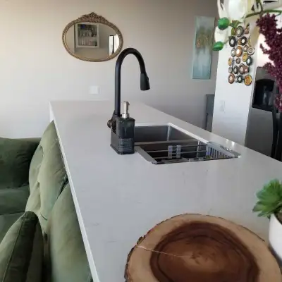 Waterfront corner unit with plenty of natural light. In unit laundry, all appliances, parking, locke...