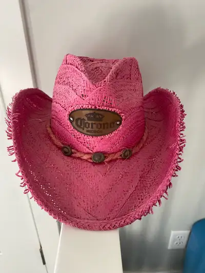 Pink Corona Cowboy hat and is in excellent condition, some sun fading on top but not noticeable when...