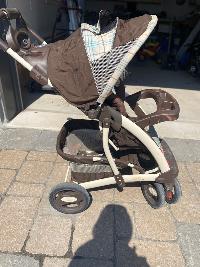 Poussette Graco  dans Poussettes, porte-bébés et sièges d'auto  à Laval/Rive Nord